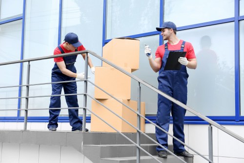 Office staff investigating a removals service issue