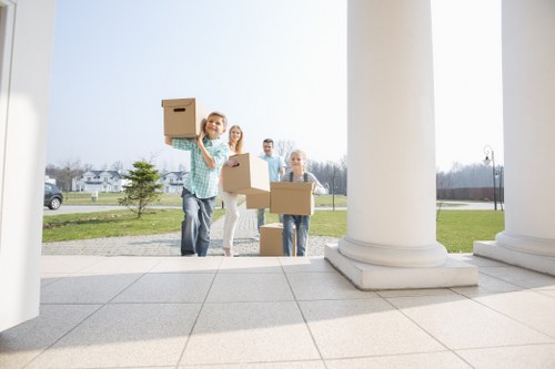 Moving van and packed boxes for house removals in Sydenham