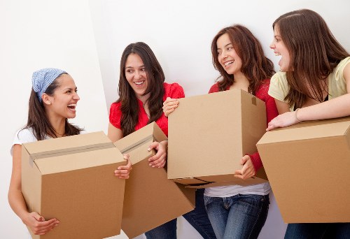 Packed boxes and furniture ready for a home move in Sydenham