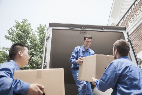 Van service loading furniture for a local delivery in Sydenham
