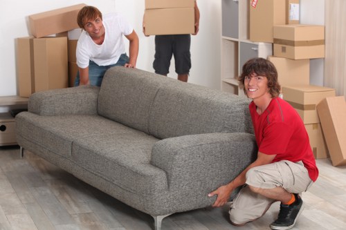 Packed boxes and protected furniture ready for transport in Sydenham