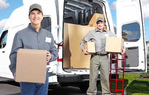 Local packing team assisting with residential and commercial moving needs
