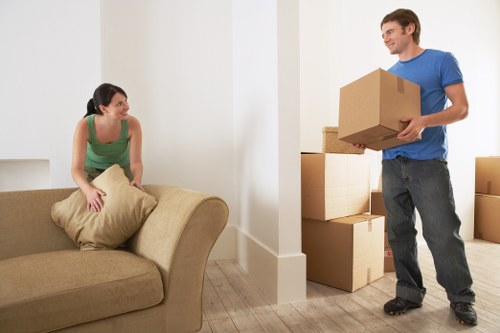 Packed boxes and furniture ready for local transport